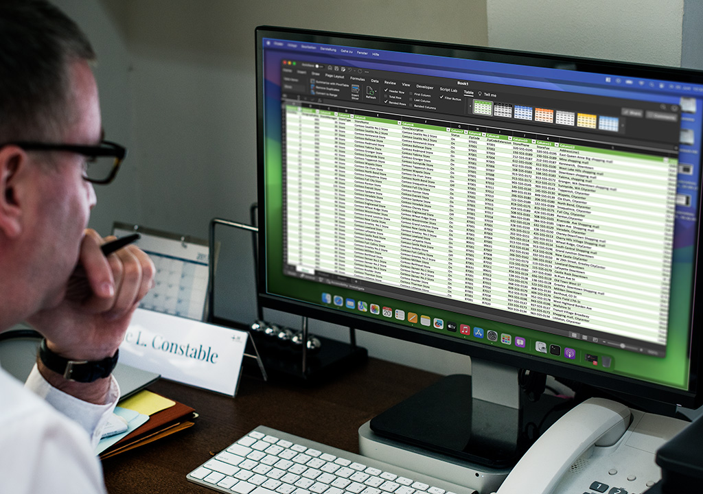 A man using Microsoft Office on MacOS Sonoma