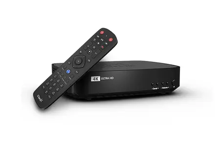 Imagem da caixa 4k e o controle remoto por voz.